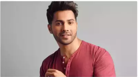 Varun Dhawan sports Team India jersey