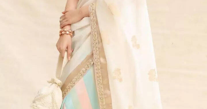 Kriti exhibits ethereal beauty in white saree