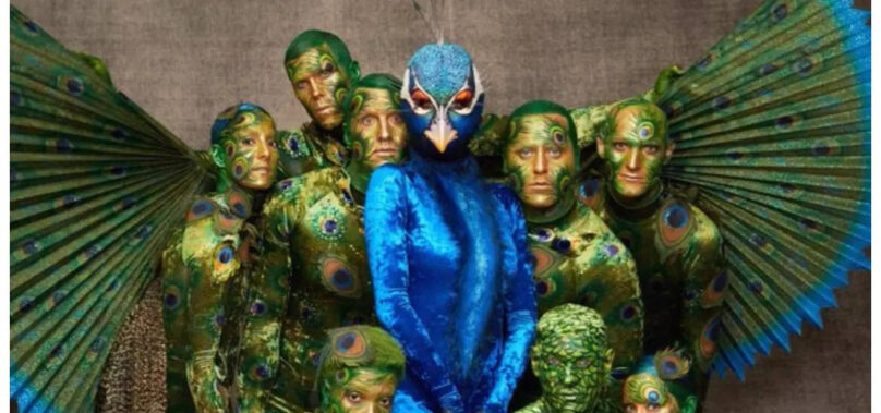 Heidi Klum turns into a peacock for Halloween