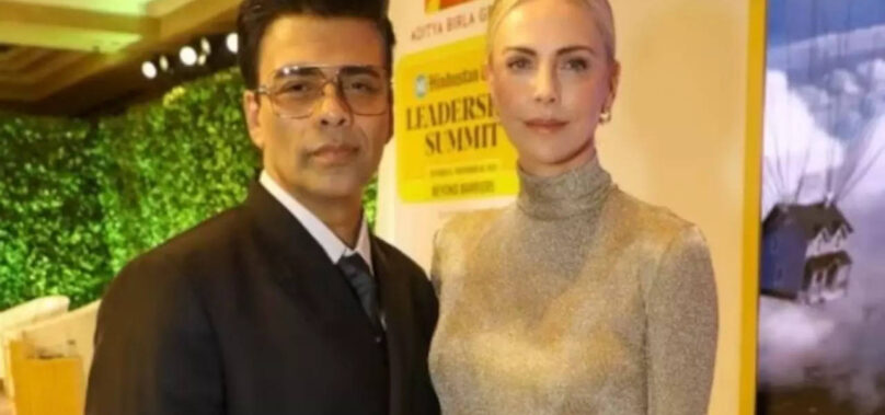 KJo poses with Charlize Theron – view pics