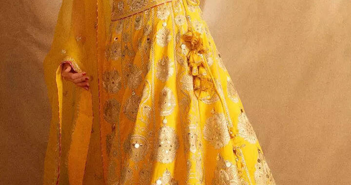 Sara stuns in yellow lehenga