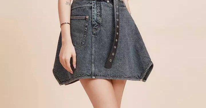 Khushi’s chic look in a black top and denim skirt