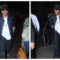 SRK makes a stylish appearance at the airport