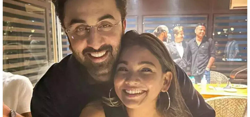 Ranbir cuddles up with a fan for a photo