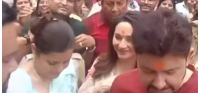 Madhuri and Dr.Nene get mobbed at a temple