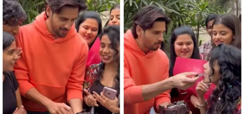 Sidharth cuts cake with his fans on his birthday