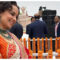 Kangana stuns in white-orange saree at Ram Mandir