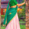 Pooja stuns in green and pink silk lehenga