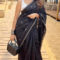 Mrunal Thakur stuns in a classic black saree