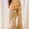 Nora stuns in an exquisite beige saree