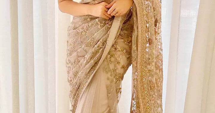 Nora stuns in an exquisite beige saree