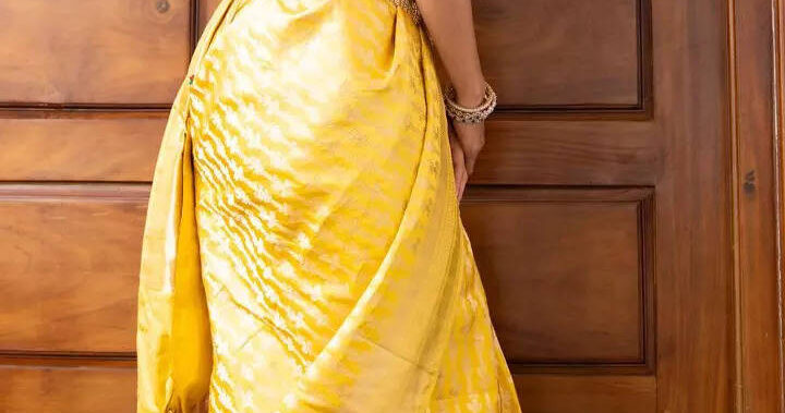 Pooja Hegde’s traditional look in yellow Banarasi saree