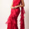 Nora paints the town red in a ruffled saree