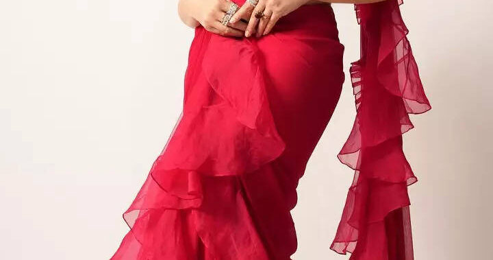 Nora paints the town red in a ruffled saree