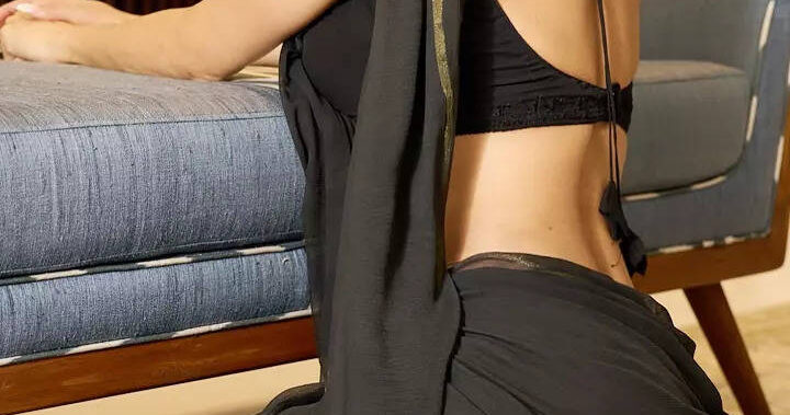 Mouni enchants fans in a simple black saree