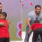 Salman Khan gives a hug to a young fan on stage